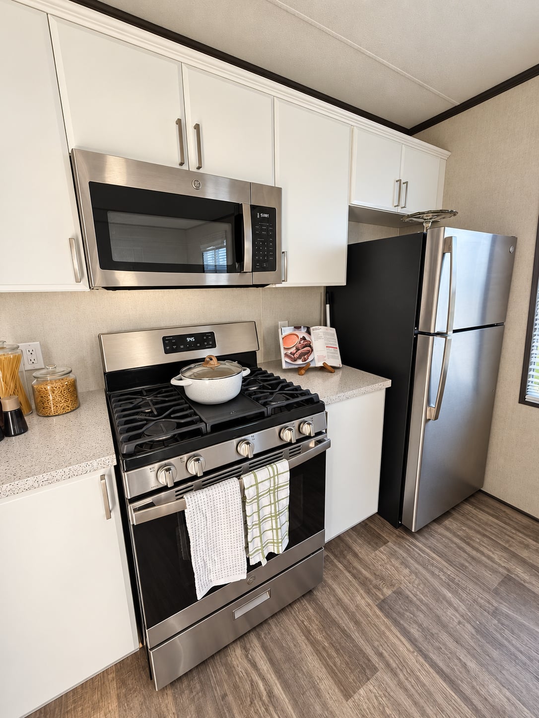 Kitchen with five burner gas range