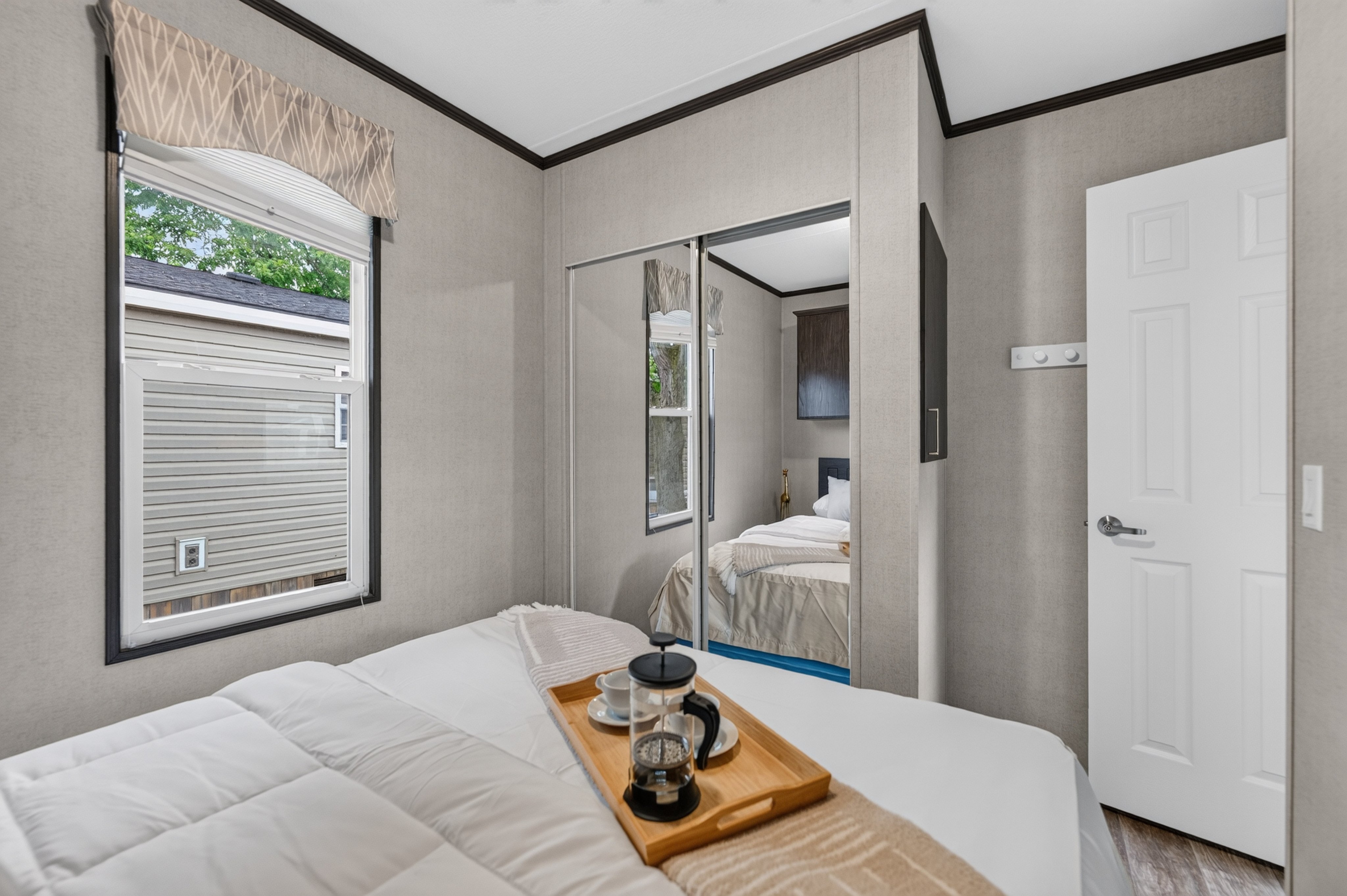 Double mirrored closets in the primary bedroom at 510 Grapevine Drive
