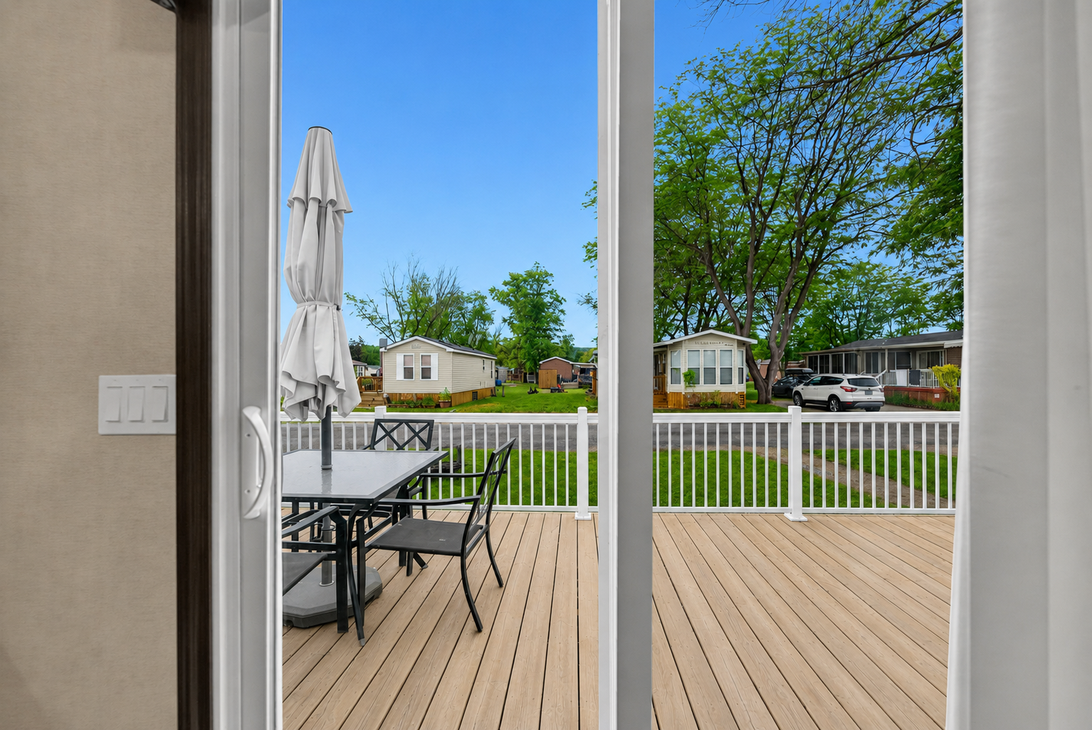 The deck seen from inside the cottage at 510 Grapevine Drive