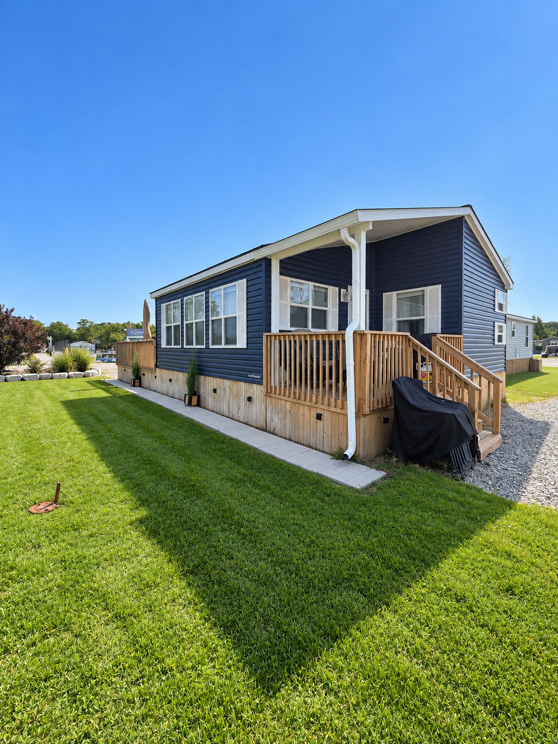 The wrapped front deck and lawn