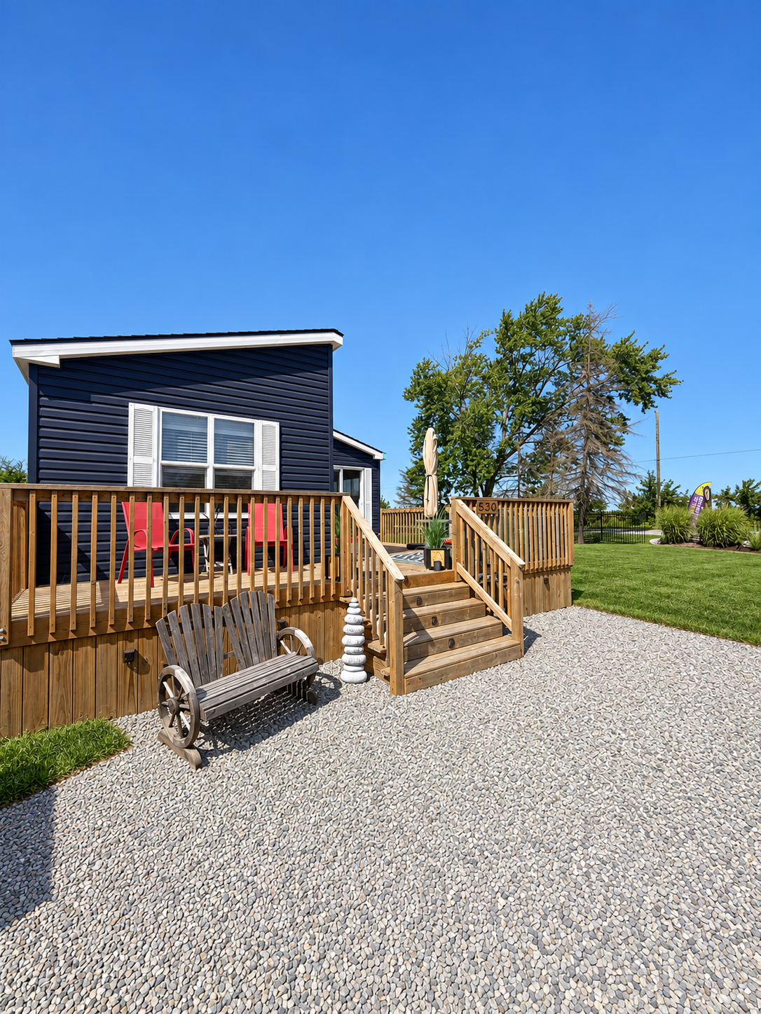 Front of the cottage and gravel driveway